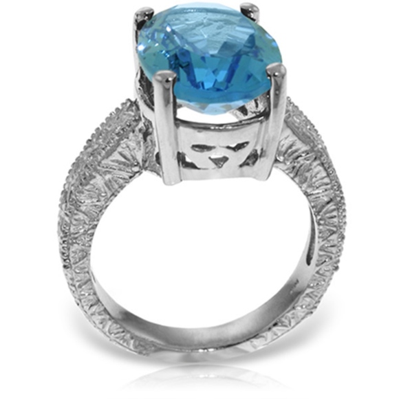 14K. SOLID GOLD RING WITH NATURAL OVAL BLUE TOPAZ - Picture 2 of 6